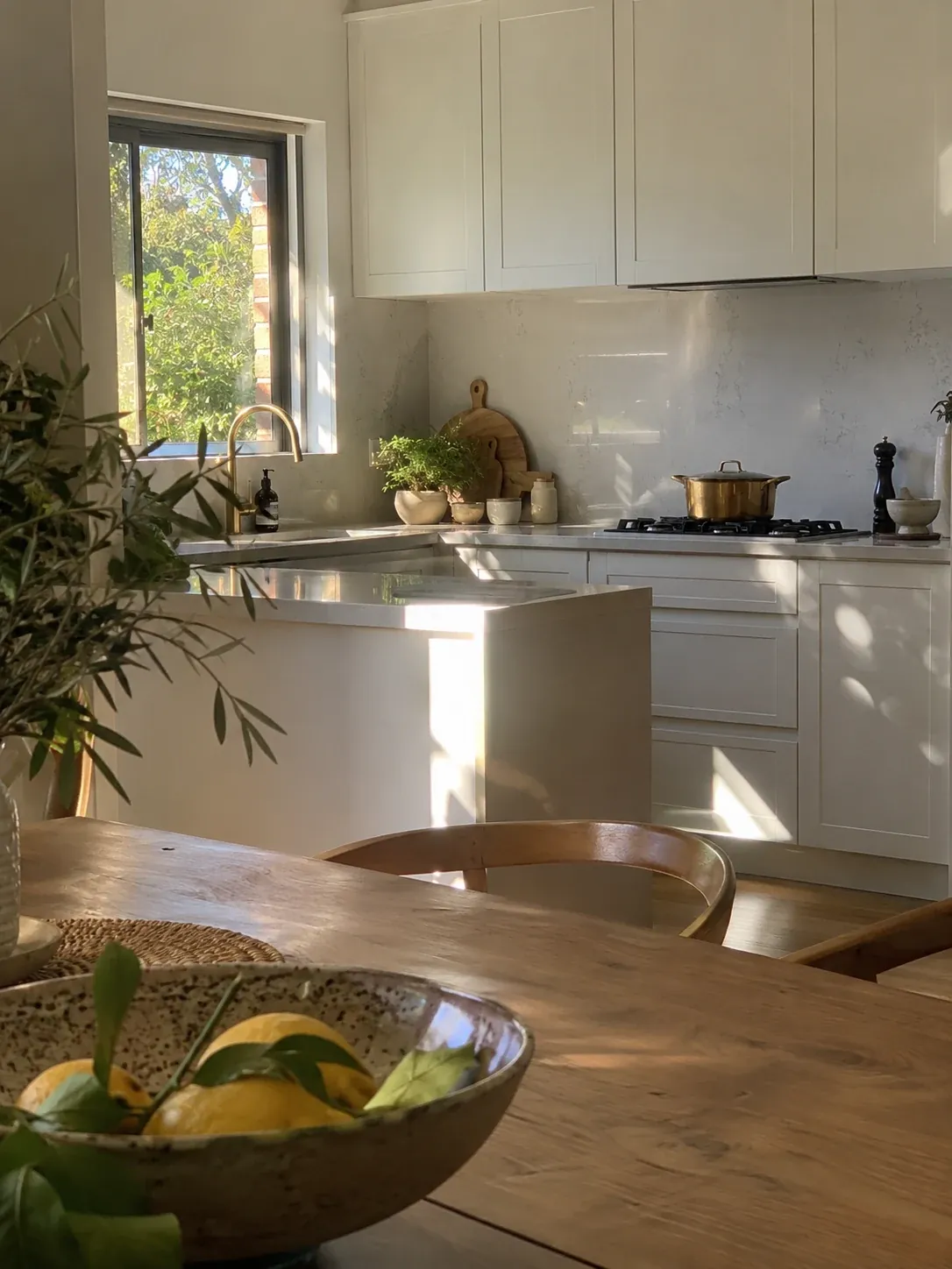 Kitchen with the cooktop in the south-east corner and morning light